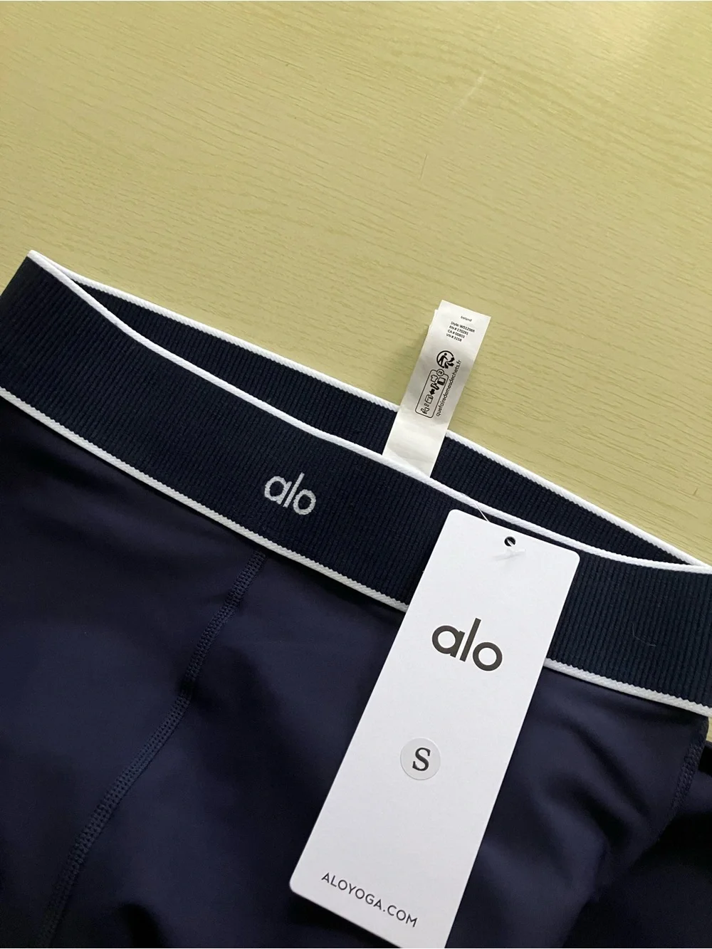 ALO Yoga Navy Blue Padded Sports Bra with White Trim - Picture 6 of 6